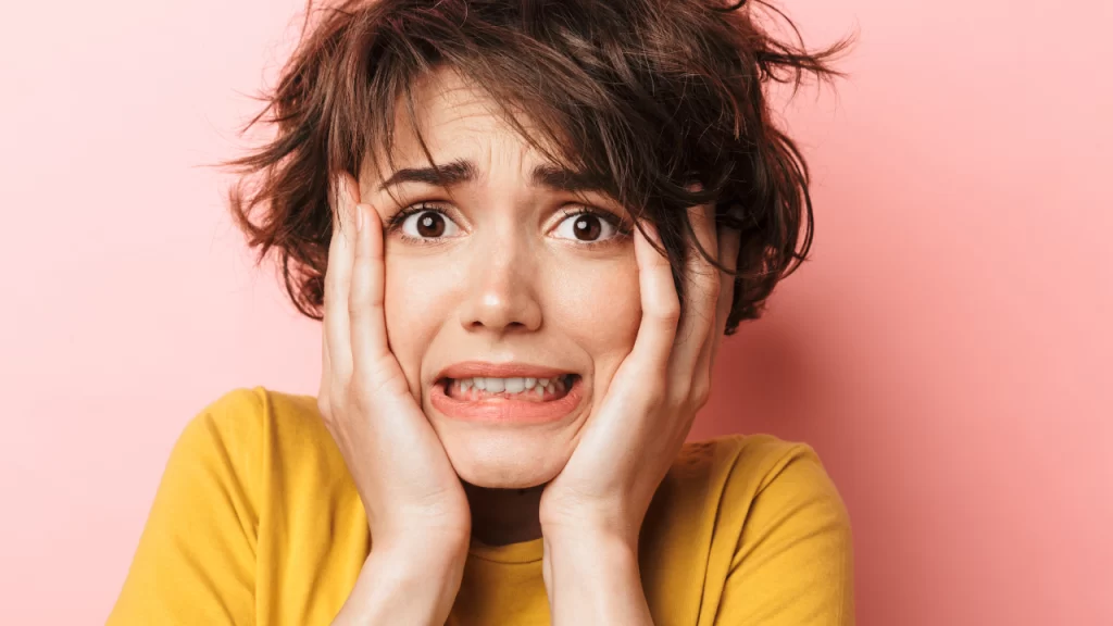 Photo of woman with a scared expression