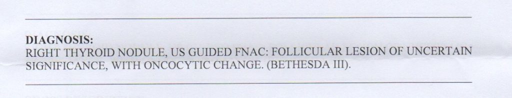 Cytology report of thyroid nodule showing a Bethesda III lesion