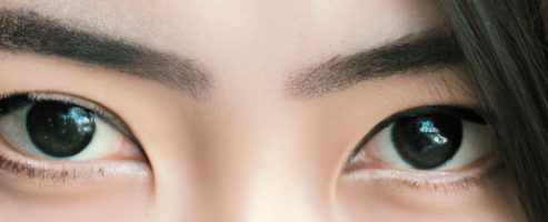 beautiful eyes asian girl straight gaze photo of an Oriental girl with beautiful eyes